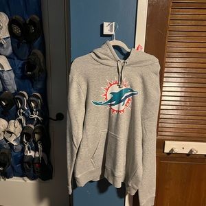 Miami Dolphins TUA sweater.